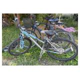 3 Schwinn bikes and carrier as shown