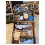 Two boxes of assorted electrical supplies, wire nuts, strap hangers, boxes, and more