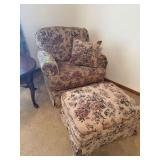 Floral pattern overstuffed arm chair and matching ottoman