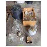 2 oil lamps with a different shade for everyday of the week and enamel cowboy coffee pot
