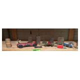 4 cast iron banks, car, tin airplane, rubber car etc...