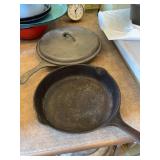 Two cast skillets