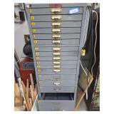 Steel storage cabinet 20x25x52 with contents