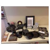 Miniature cast skillets, muffin tins, bell, Camel cast ash tray and more