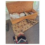 Chest 56x21x16 with blankets, pillows