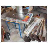 Shovels, plastic sheeting, typewriter cart, SunShield