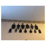 Collection Cast trivets, 1961 cast Cleaning lady figurines