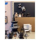 Miniature cook stoves, glass cats, small lantern