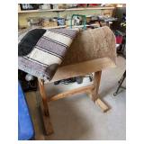 Saddle stand, two saddle blankets