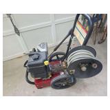 Pressure washer pulls over