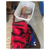Large duffel bag rugs and shirts in tote