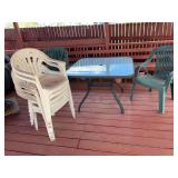 Patio table and resin chairs