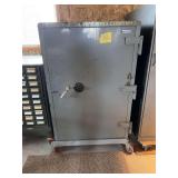 Safe (lock has been removed).  This item is storage only and very heavy.  You must bring help to move 33x30x55 on rollers