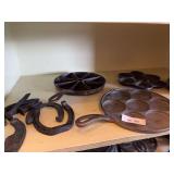 Cast egg bake pans, horse shoes and spikes
