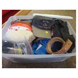 Tote of hats, belts and gloves