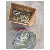 Linch pins and a can of staples