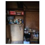 Paper cutter speakers, books, contents of closet