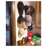 Ball caps, flashlights, small tools, batteries-contents of all lower cabinets and drawers, countertop of laundry room