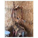 Pack saddle, bridle stall, breast strap, Finch and blanket pads, Saddle rack (bring tools to remove it if you want it)