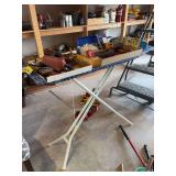 Ironing board, all contents on top