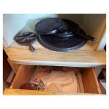 Cast griddles and egg cooker, towels, cups (bring box to pack)