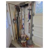 Shovels, brooms, post hole digger, gas cans, funnels