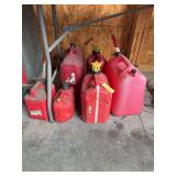 Six various size gas cans