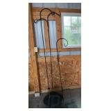 Three shepherds hooks and two suet feeders