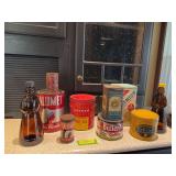 Vintage cans includes Calumet baking powder, Butternut coffee, Royal baking powder, Premium saltines, two glass Aunt Jemima syrup bottles, etc
