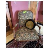Accent arm chair with floral tapestry pattern and pillow