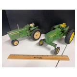 2 John Deere toy tractors