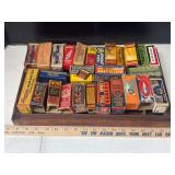 Printers drawer and 29 assorted empty spark plug boxes
