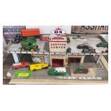 DX Service Center tin garage and cars as shown