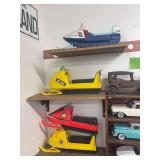 4 plastic snowmobiles