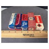 5 antique boxed spark plugs as shown