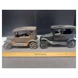 2 cast iron vehicles