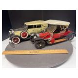 2 plastic model cars