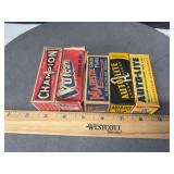 5 antique boxed spark plugs as shown