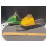 2 battery operated snowmobiles