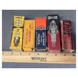 5 antique boxed spark plugs as shown