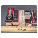 5 antique boxed spark plugs as shown