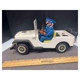 Battery operated pressed tin police jeep
