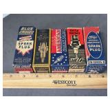 5 antique boxed spark plugs as shown