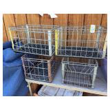 Four metal milk crates