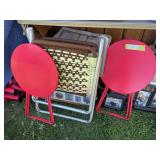 Two metal fold up patio tables and folding lawn chair