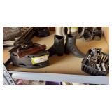Very heavy cast-iron shoe doorstops, miniatures, and large antique coal iron