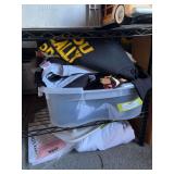 Tote full of all new T-shirts, many size XL with assortment of screen printing on them