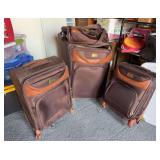 Caribbean Joe four piece rolling luggage set, swiveling casters
