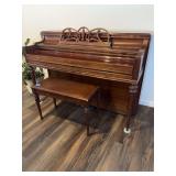 Everett Dark Wood Spinet Piano featuring an ornate carved music rack and a matching wooden bench. 58X26-bring help to move