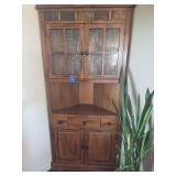 Sunny Designs Sedona Corner China Cabinet, showcasing distinctive slate tile accents along the top crown and seeded glass upper doors. 37x20x76